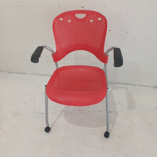 Herman millar-Stack chair-With arms- on wheels-Red