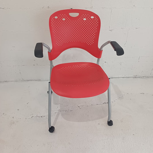 Herman Millar-Stack chair- With arms- On wheels- Red