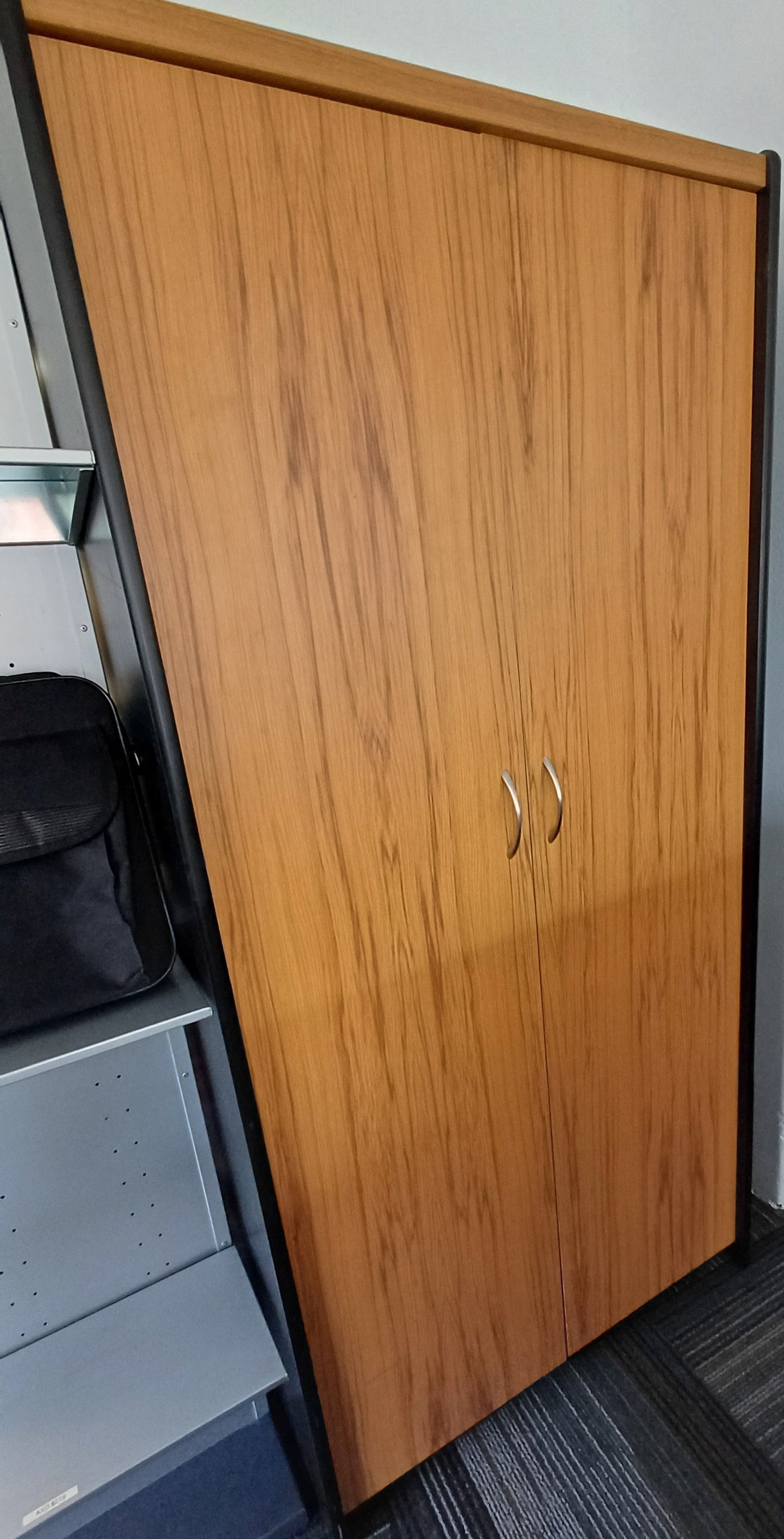 Brown double door cupboard