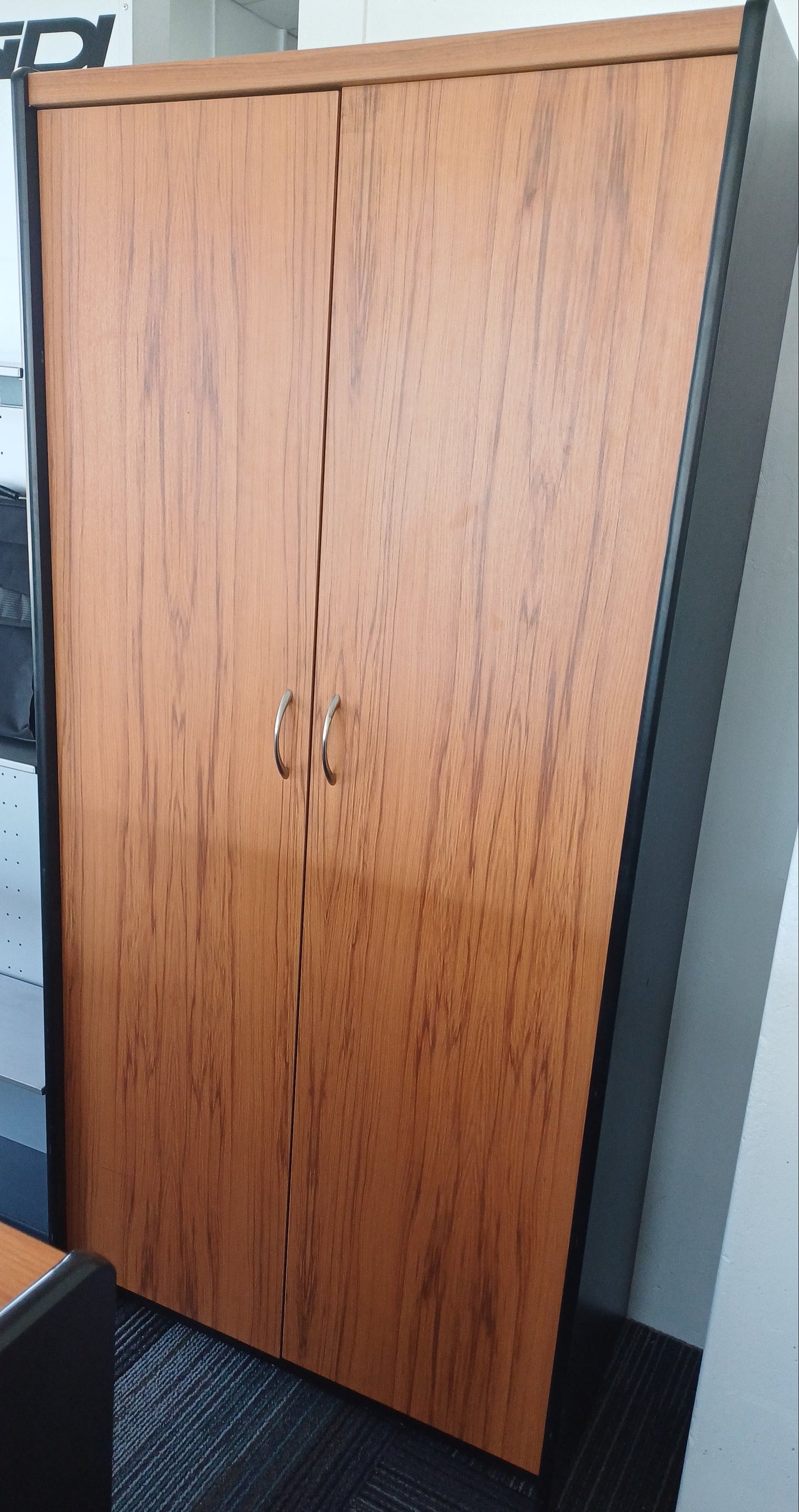 Brown double door cupboard