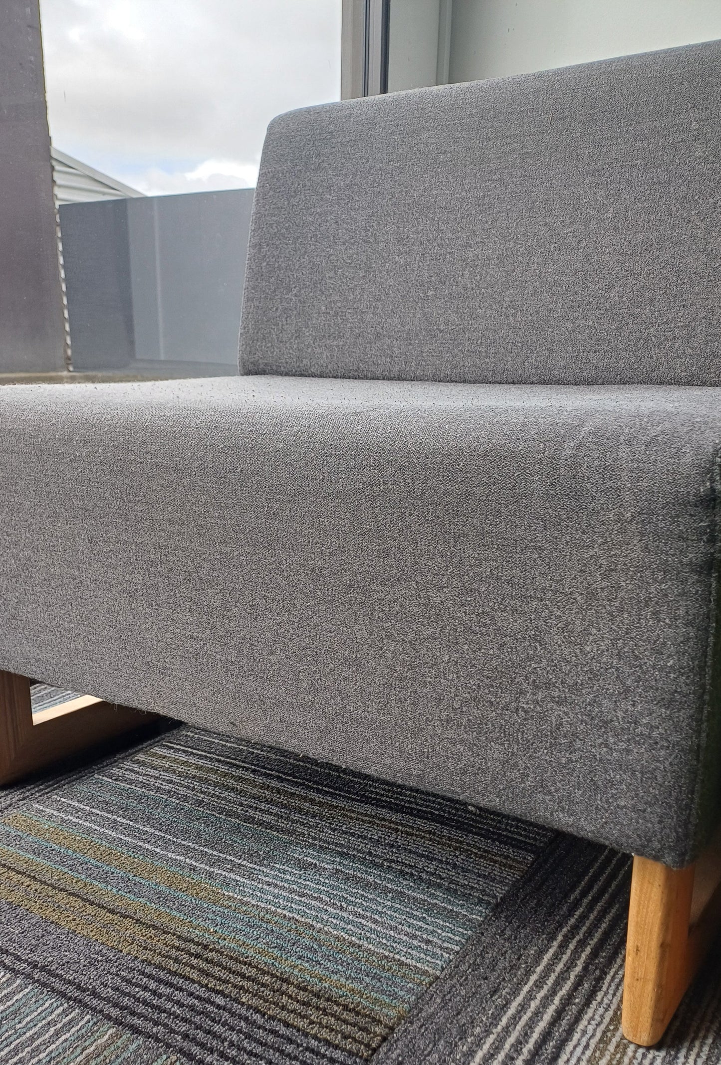 Single Seater dark grey couch